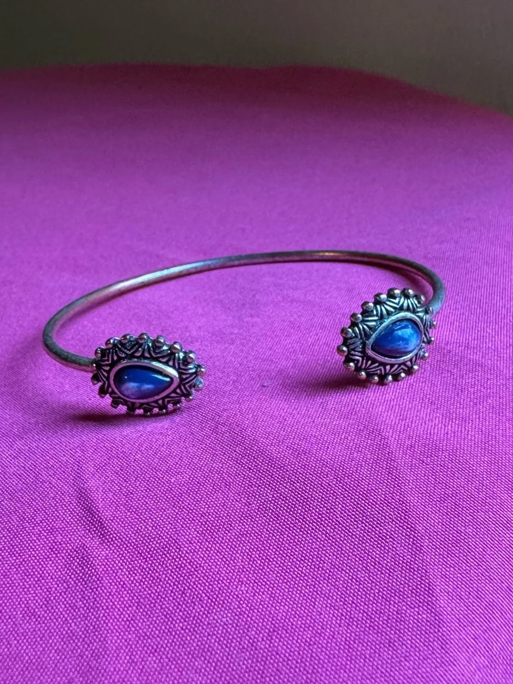 Silver Open Bangle Bracelet with Blue Stone Accents